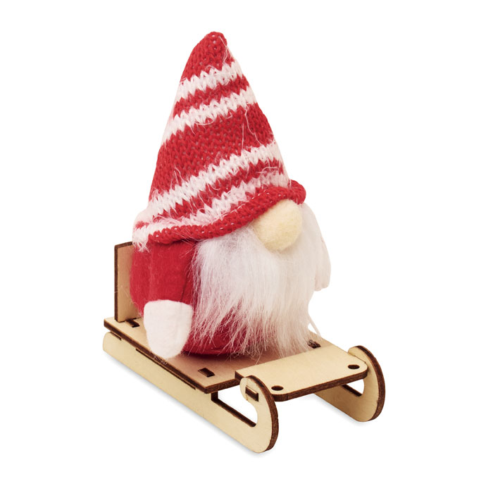 Gnomo su slitta di legno